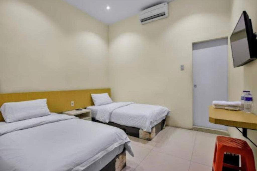 Oyo 92772 Losmen Diah Syariah Langsa Bagian luar foto